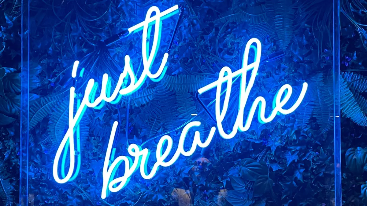 Just breathe neon sign