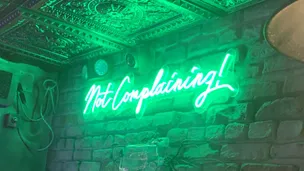 Not complaining neon sign