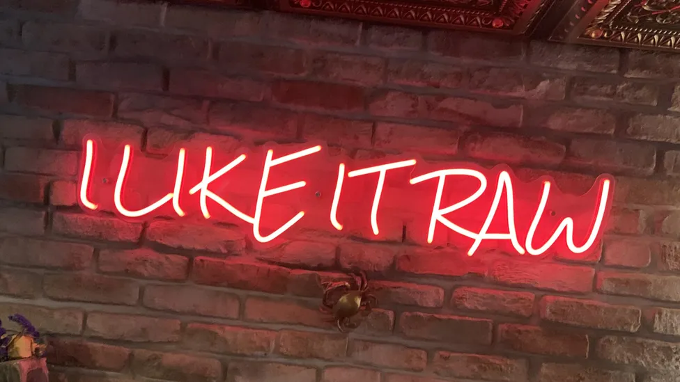 Raw neon sign