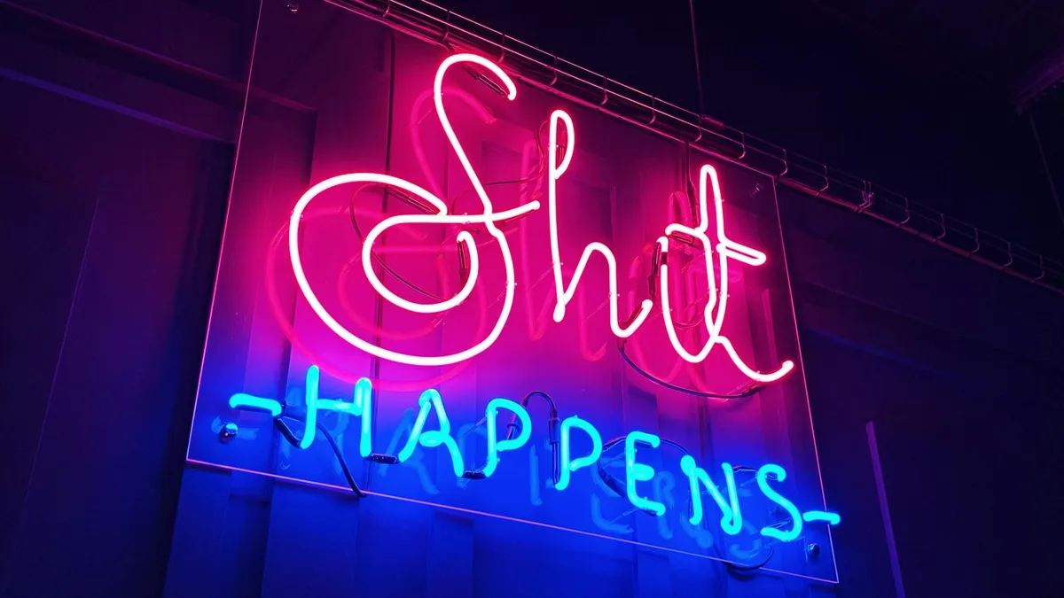 Shit happens neon sign