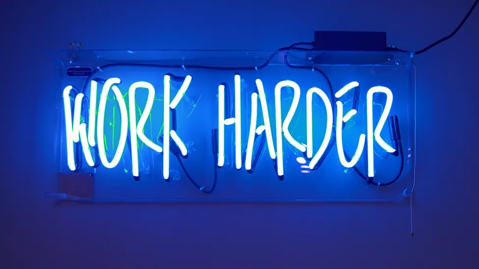 Work harder neon sign